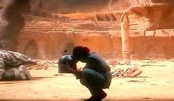 Fett mourning the loss of his father, following the Battle of Geonosis.