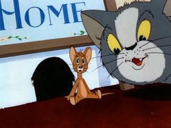 A screenshot from the 1940 Oscar Nominated Puss Gets the Boot, the very first Tom and Jerry cartoon.